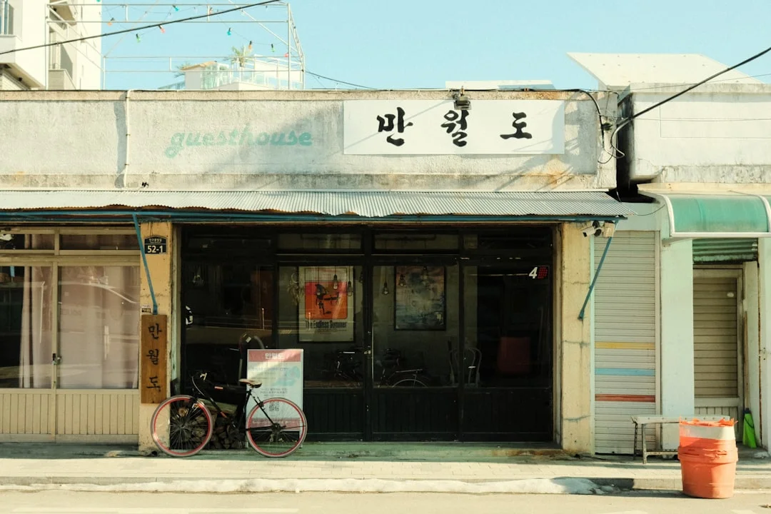 a bicycle is parked outside of a store