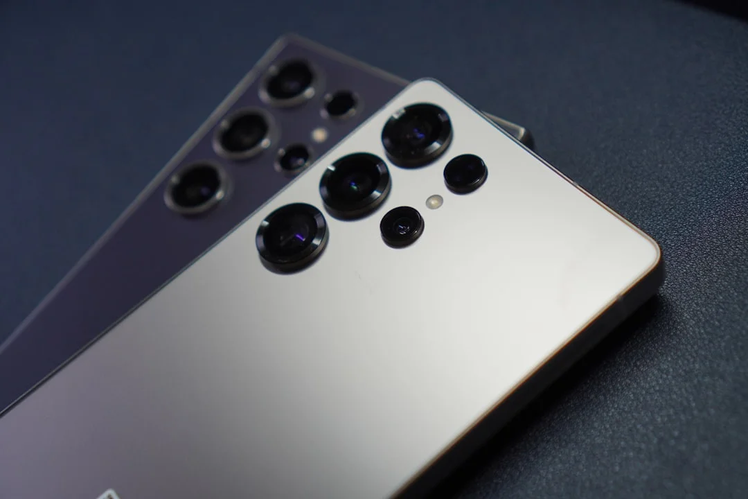 Two smartphones with multiple camera lenses.
