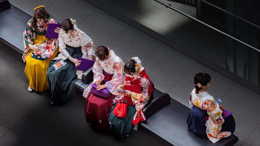 women sitting on the stairs