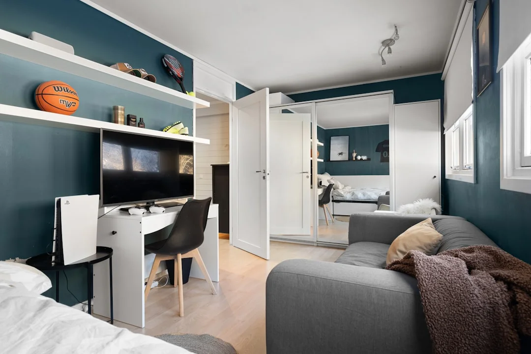 A living room filled with furniture and a flat screen TV