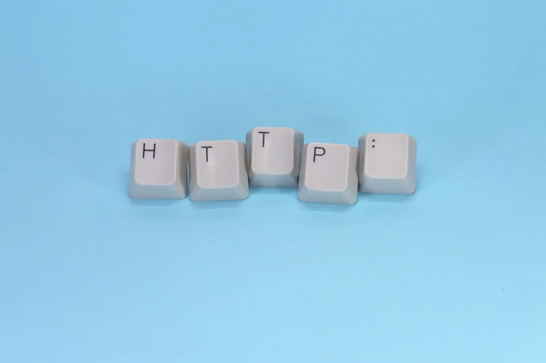 Keys spell out "http" on a blue background.