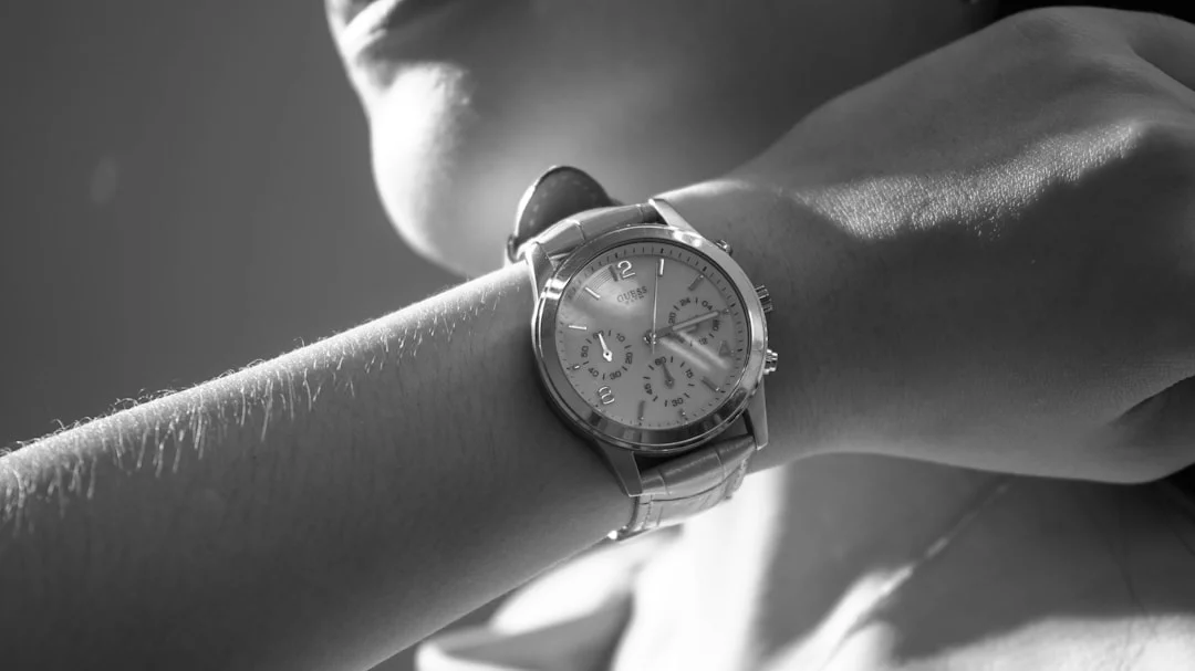 a close up of a person wearing a watch