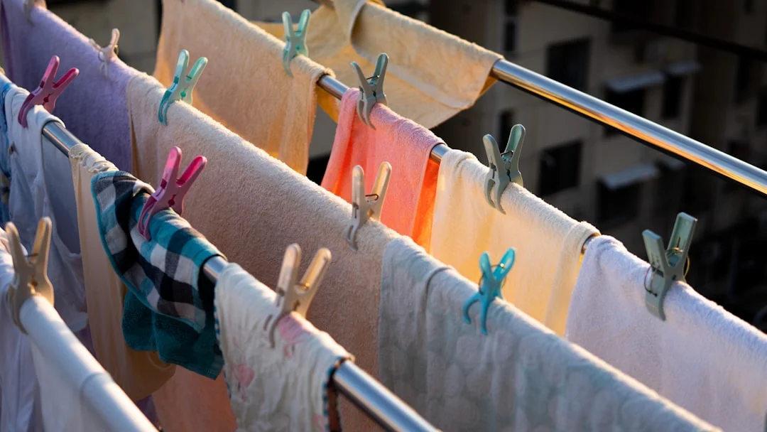 white and pink clothes hanger