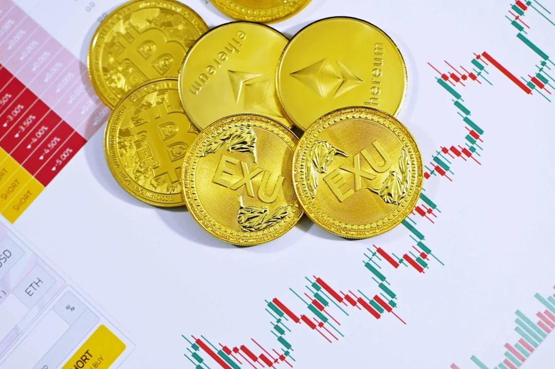gold round coins on white surface