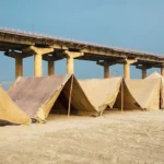 a bridge with a group of tents