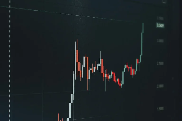 Stock market chart showing upward trend.