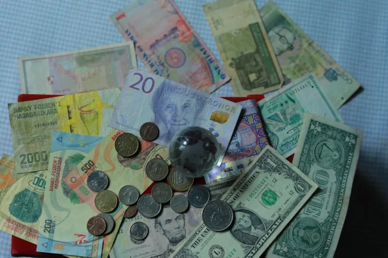 a pile of money sitting on top of a table