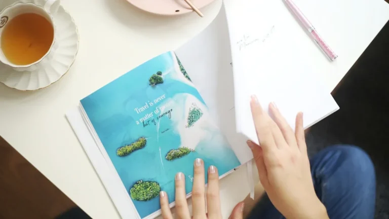 a person's hands on a book