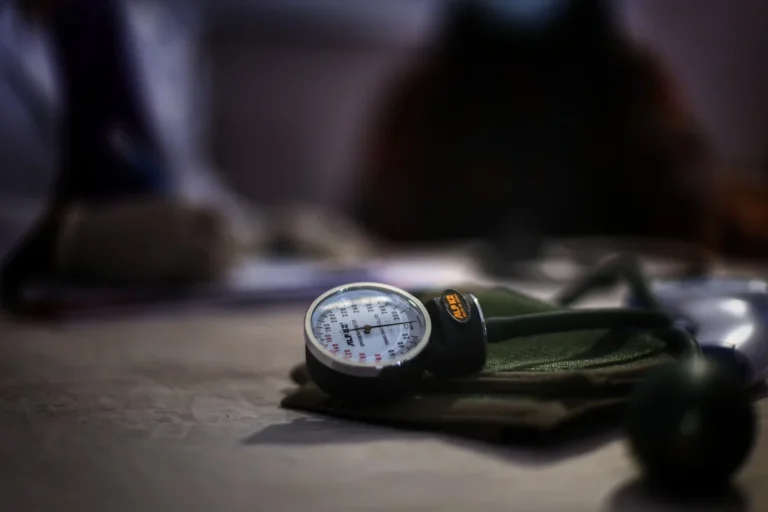 Blood pressure monitor resting on a table.